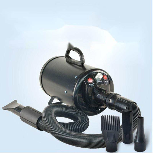 Black pet hair dryer with hose and multiple nozzle attachments for dog grooming